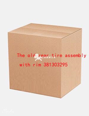 The old rear tire assembly with rim 381303295